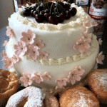 Cherry Blossom Cake Ideas with pink petals on white stand