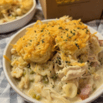 Chicken breast crockpot recipe with creamy gravy and biscuits