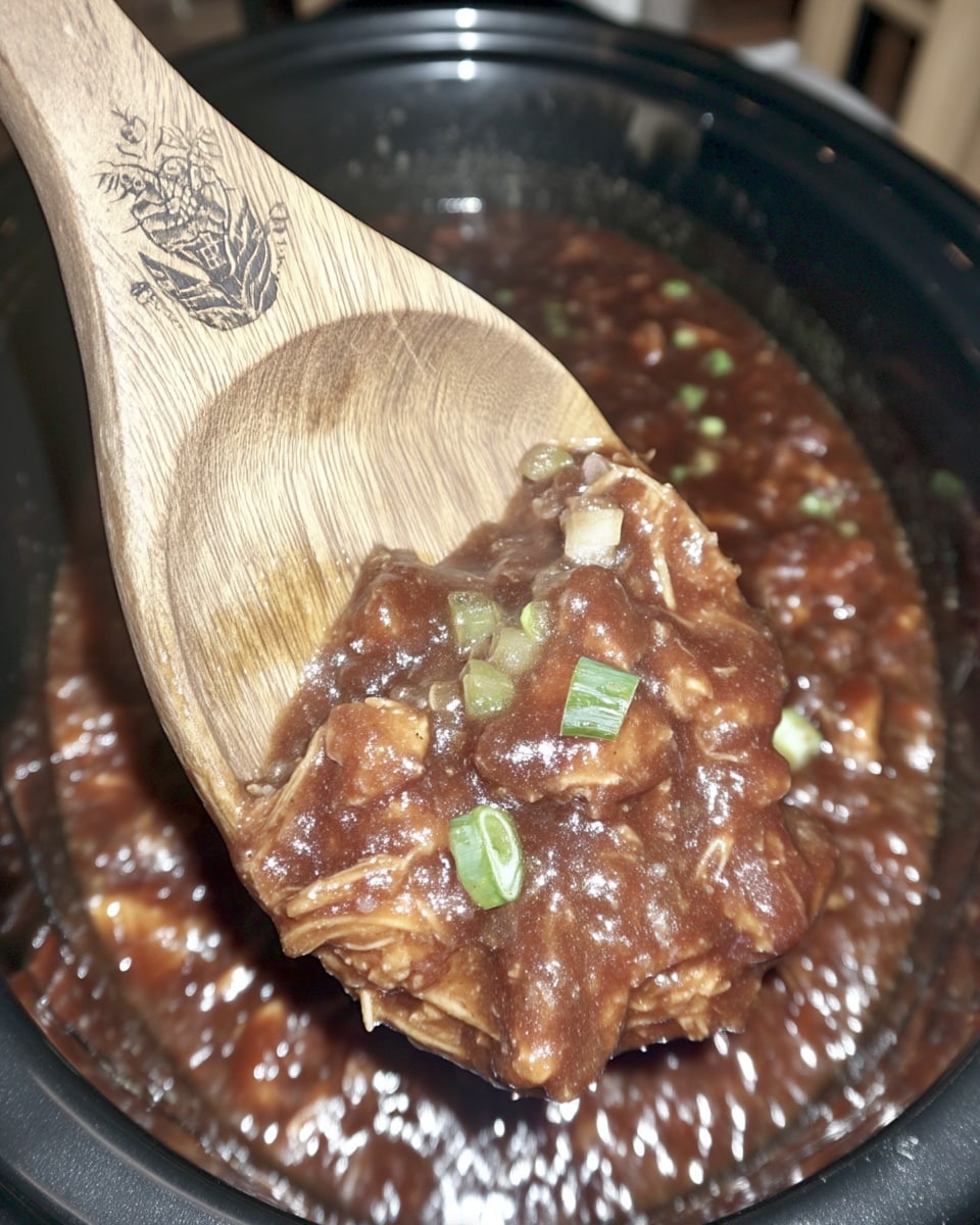 Crockpot dishes chicken thighs with bourbon sauce