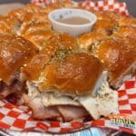 Easy Hawaiian roll sliders with ham and Swiss cheese! The perfect appetizer or party food for tailgating, Super Bowl, birthdays, or any celebration. Get the simple recipe now!