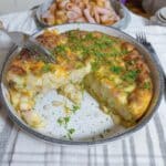 Fritata recipe dinner served on a white plate with herbs
