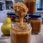 Easy Crockpot Pear Butter Recipe! Learn how to make delicious spiced pear butter in your slow cooker with this simple canning recipe. Perfect for homemade jam and hostess gifts!