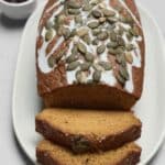 Copycat Starbucks Pumpkin Bread recipe! Easy, moist, and topped with pumpkin seeds. Bake two loaves in 1 hour 15 minutes. #pumpkinbread #starbucks #baking #recipe #dessert