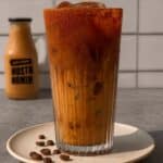 Iced chai latte with homemade pumpkin cold foam! A delicious and easy Starbucks copycat recipe perfect for fall. #chai #pumpkin #coldfoam #latte #starbucks #fallrecipes