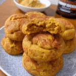 Pumpkin snickerdoodle cookies cooling on wire rack