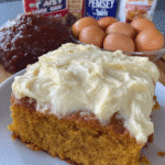 Spice cake mix and pumpkin cake sliced with frosting