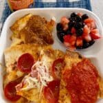 Quick Pepperoni Pizza Quesadilla recipe! The perfect easy lunch idea for kids and adults. Great for picky eaters, school lunches, daycare meals, or a fun and simple weeknight dinner. Get the recipe and tips for packing in lunchboxes.