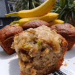 Zucchini banana bread sliced on wooden board