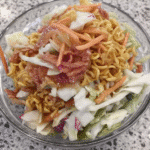 Ingredients for Asian Slaw arranged on a table.