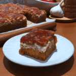 Perfectly baked pumpkin brownies with a visible swirl pattern from the pumpkin and brownie batters.