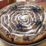 Ingredients laid out for White Chocolate Spiderweb Brownies: chocolate, butter, eggs, sugar, flour, cocoa powder, etc.